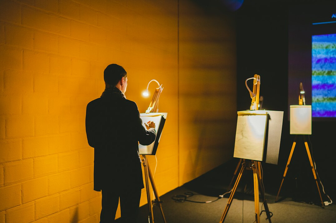 Brazilian man practicing a presentation alone in a bright room